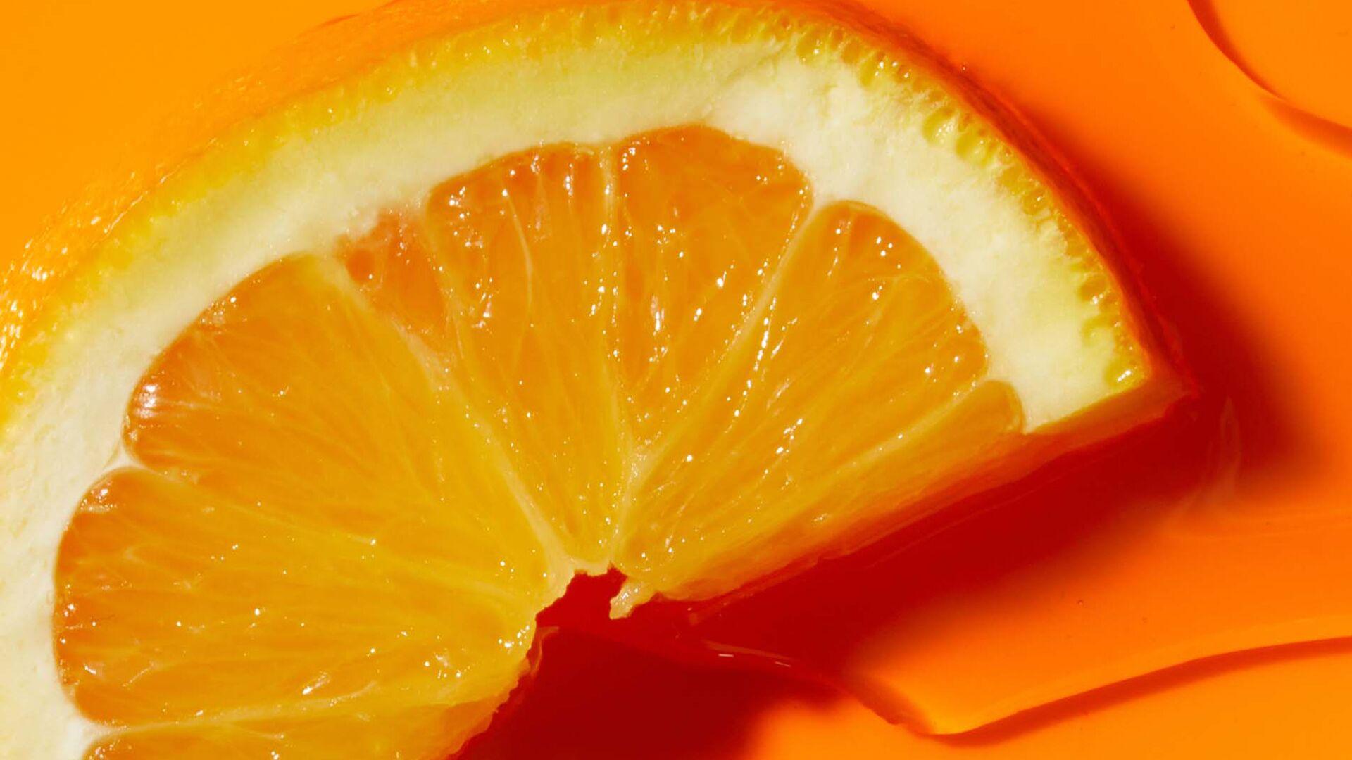 Close up of an orange and Vitamin C skincare