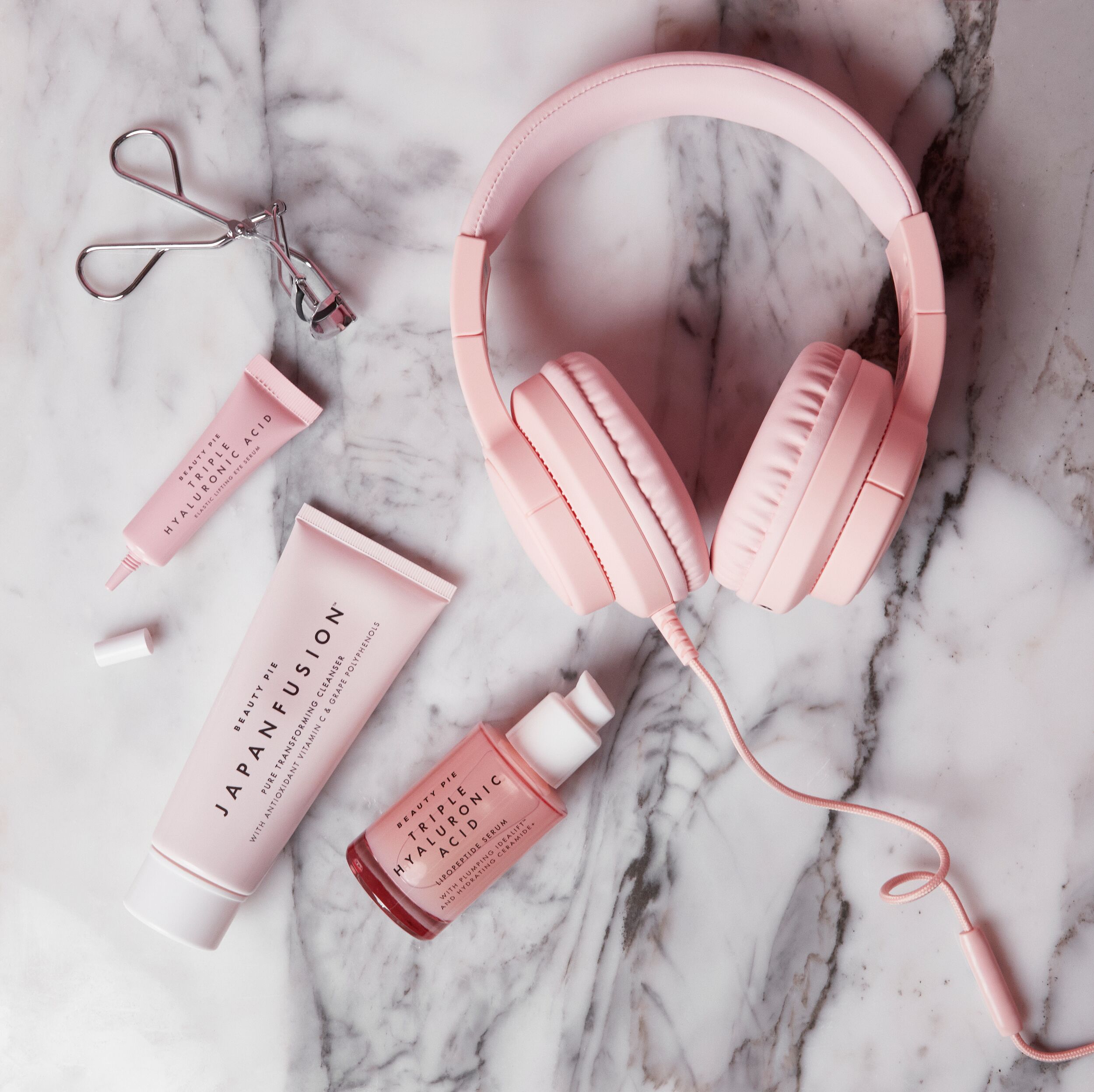 skincare-sounds-headphones.jpg Beauty Pie products and headphones